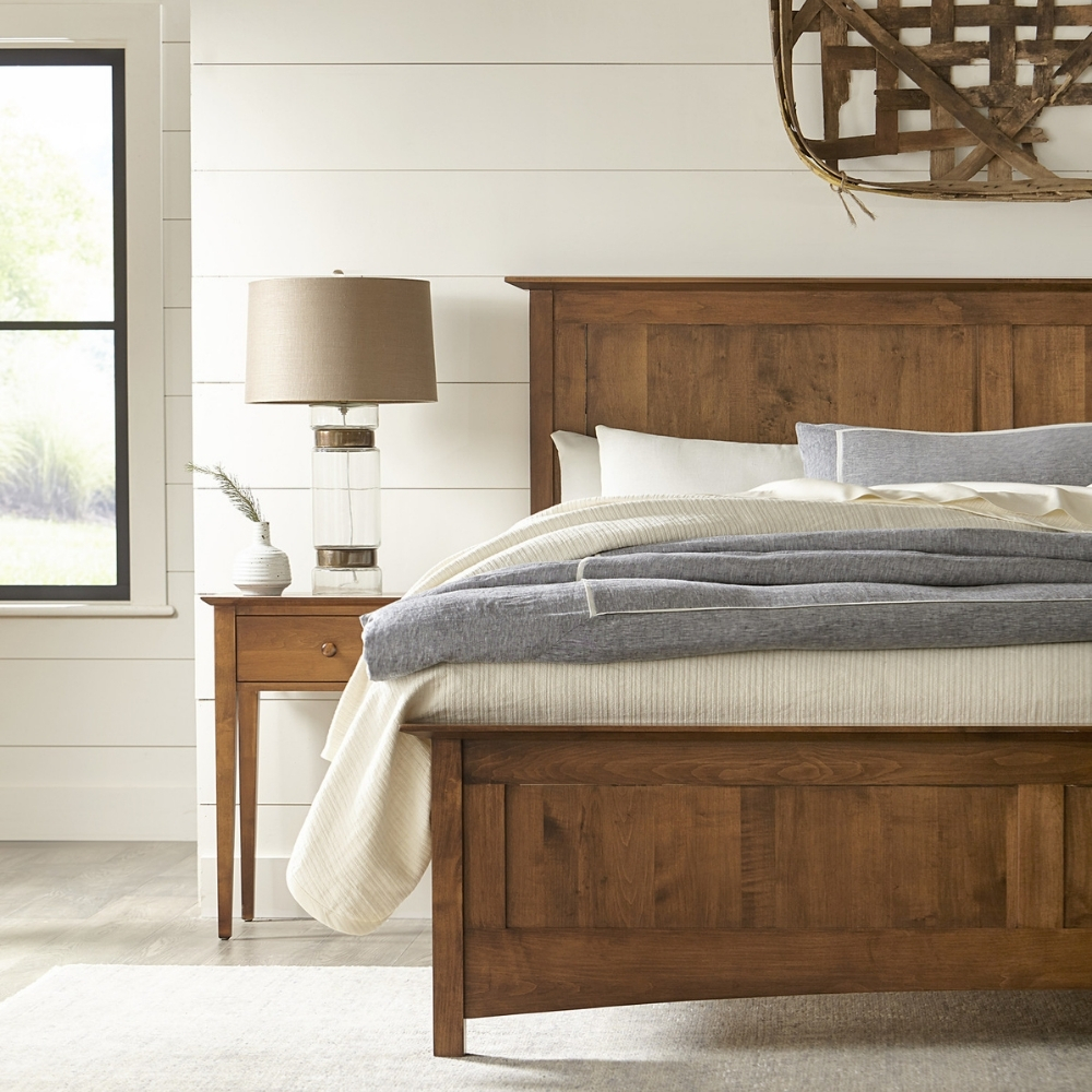 stickley origins bedroom scene with bed and nightstand