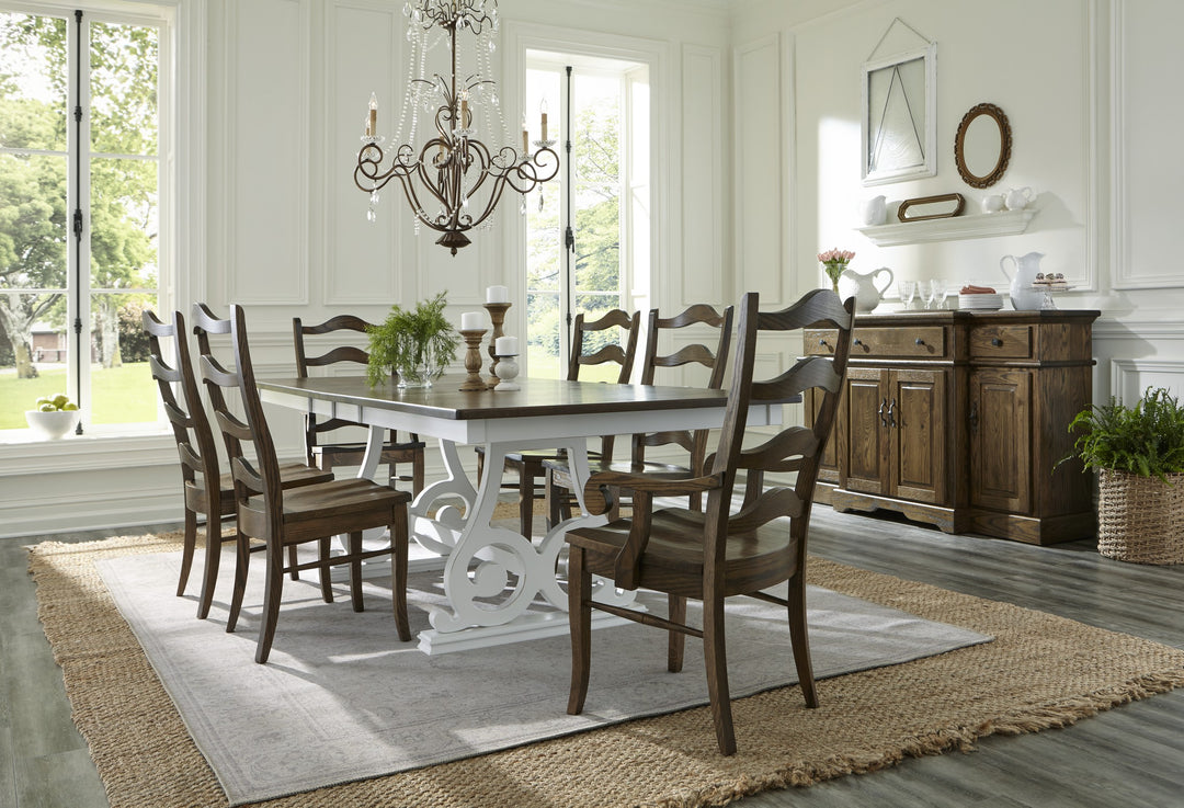 Traditional style rectangle dining table surrounded by traditional dark wood dining chairs