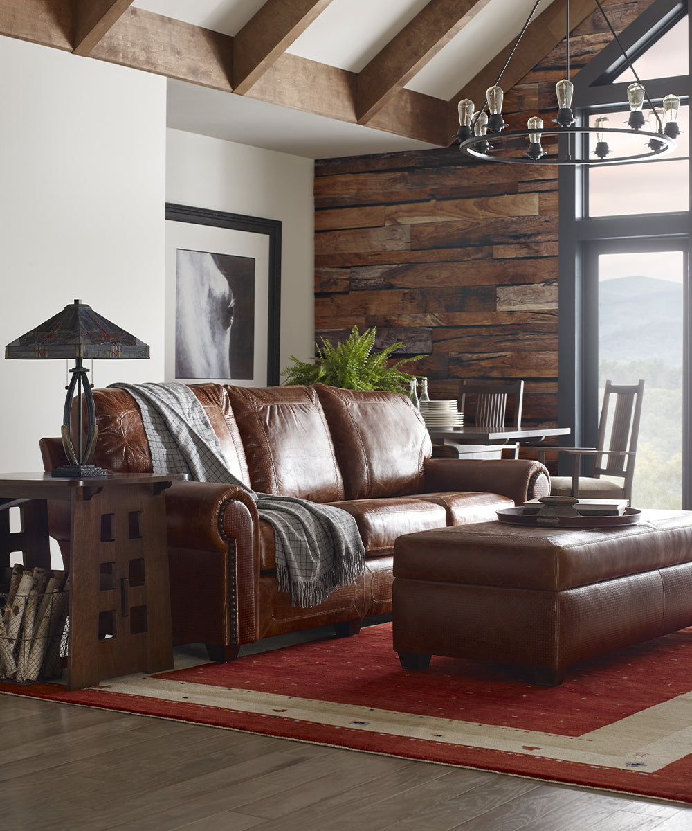 Stickley's leather Santa Fe sofa in a rustic living room scene.