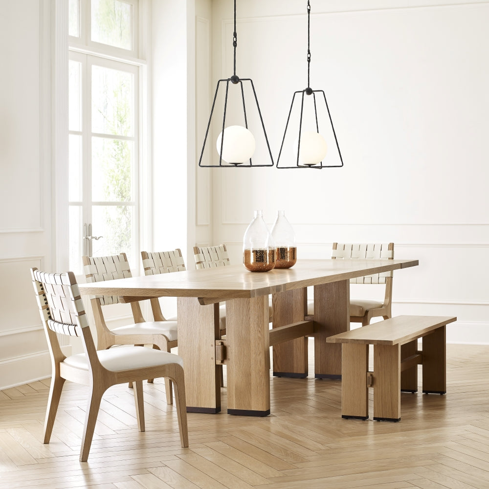 light wood dining table with matching bench and dining chairs from Stickley's Portfolio120 collection.
