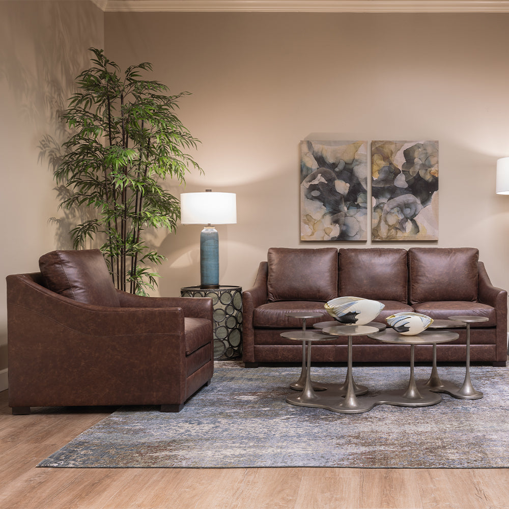 Seldens exclusive Banks chair and sofa in dark brown leather on display at Seldens Tacoma showroom.