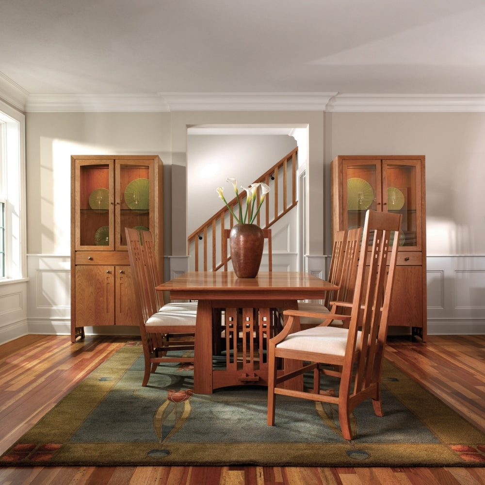 dining room scene with large wood dining table surrounded by dining chairs