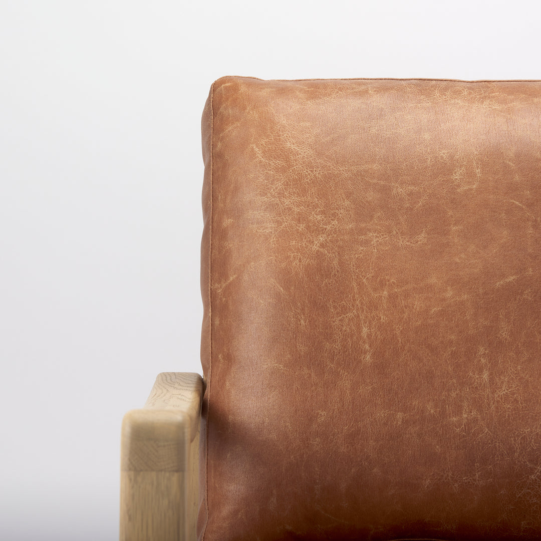 Raeleigh Tan Faux Leather Accent Chair Living Room Mercana