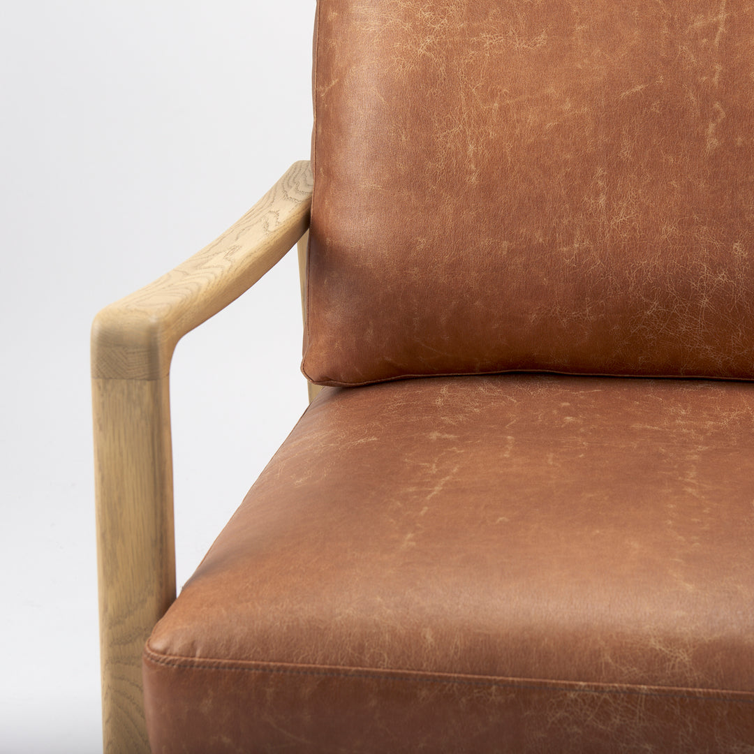 Raeleigh Tan Faux Leather Accent Chair Living Room Mercana