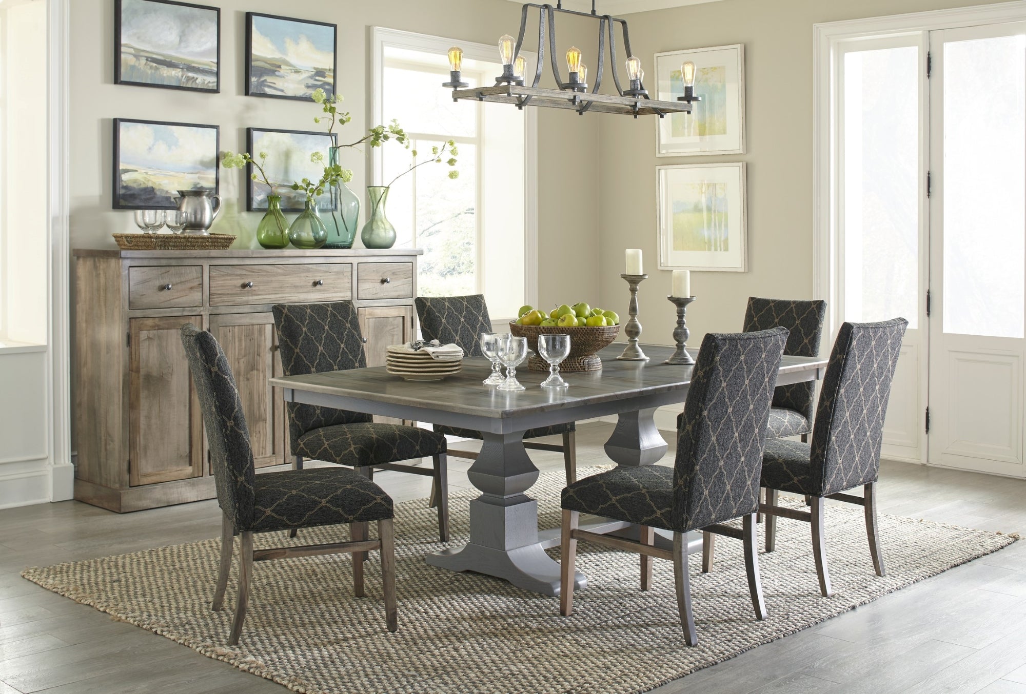 Dining room with a large rectangle dining table surrounded by fabric dining chairs