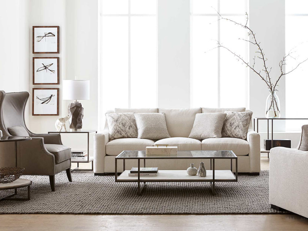 Living room scene featuring a sofa and chairs in neutral colors from Bernhardt furniture.