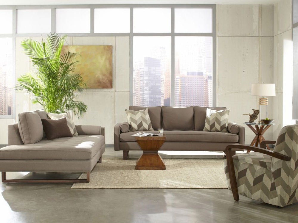 A light brown sofa and a light brown chaise in a modern living room scene from Jonathan Louis.