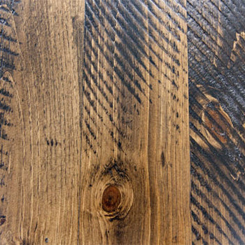 sample of rough sawn distressing on a piece of wood