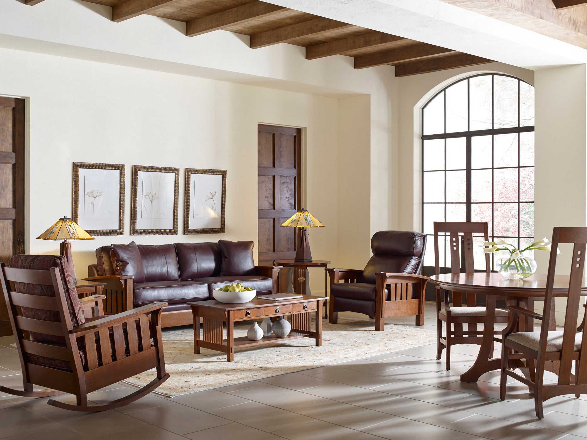 Large living room scene with small dining area from Stickley's Mission collection.